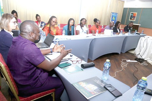 Prof. Samuel Kobina Annim, Government Statistician, addressing guests at the Statistical Service Fishing Survey ceremony in Accra. With him to the left is Dr Francisca Francavilla, an Economic Researcher. Picture: SAMUEL TEI ADANO