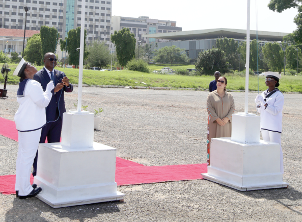 The AU and Ghana flags being hoisted to mark the African Union Day in Accra by Kwaku Ampratwum-Sarpong (left), a deputy Minister of Foreign Affairs and Regional Integration, and  Imane Ouaadil (2nd from right), Moroccan Ambassador to Ghana. Picture: SAMUEL TEI ADANO
