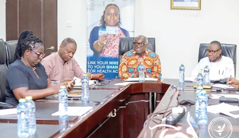 Dr Anarfi Asamoa-Baah (2nd from right), Chairman of the committee on Preventive and Promotive Health Intervention, addressing the meeting. With him include Dr Da-Costa Aboagye (right), Chief Executive Officer of NHIA, and Dr Patrick Kuma-Aboagye (2nd from left), Director-General, GHS