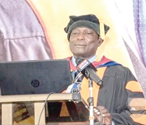 Prof Atepor (right) delivering the lecture in Cape Coast