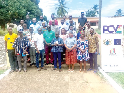 Dasebre Oduro Guranim I (4th from right) and Daniel Agbesi Latsu (2nd from left), Kadjebi NCCE Director, with some of the participants after the forum.