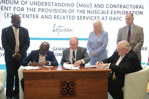 Prof. Samuel B. Dampare (seated left), Director-General, Ghana Atomic Energy Commission, together with David Cleave (seated middle), Executive Director, International Science and Technology Centre, and Robert Temple (right), General Counsel and Secretary, Nuscale Power, during the signing of the agreement in Accra.  Picture: SAMUEL TEI ADANO