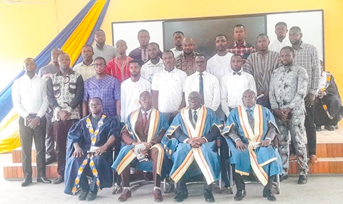 Prof. Kweku Adutwum Ayim Boakye (seated 2nd from left) and other members of faculty with students after the ceremony