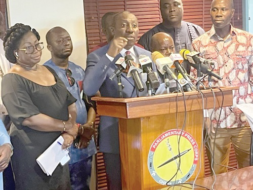 Mr Afenyo-Markin (3rd left), Majority Leader, addressing the media. With him is Patricia Appiagyei (left), Deputy Majority Leader
