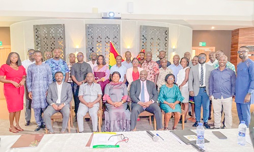 Ophelia Mensah Hayford (seated middle), Minister of MESTI; Peter Dery (seated 2nd from right), Director of Environment at MESTI; and Kingsley Ekow Gurah-Sey (seated 2nd from left), EPA Director for Environmental Assessment and Management 