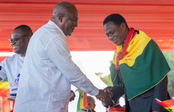John Dramani Mahama, the presidential candidate of the opposition NDC, in warm handshake with the Chairman of The Church of Pentecost at the launch of a National Peace Campaign in Accra.