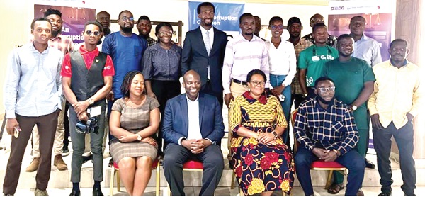 Participants with the officials at the workshop. (Seated 2nd from right) Mary Awelana Addah, the Executive Director, GII; and Dr John Osae-Kwapong (seated third from right)