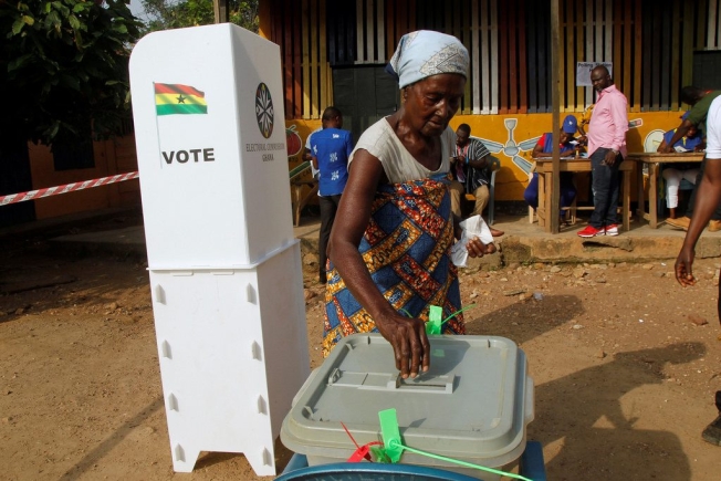 A voter casting her ballot during an election