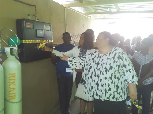  Nana Yaw Asante (left), Managing Director of Rikair Company Limited, Dr Sophia Quist (2nd from left), Ayawaso North Municipal Director of Health, and Dr Dorcas Anfu Okine (right), Medical Superintendent of the Maamobi General Hospital, inaugurating the project 