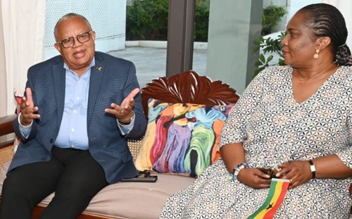 Minister of Health and Wellness, Senator Dr. The Most Honourable Jerome Walcott, in discussion with Ghana’s Deputy Minister of Health, Adelaide Ntim, at the Grantley Adams International Airport yesterday. Senator Walcott was on hand to welcome 155 Ghanaian nurses to Barbados. (Ministry of Health and Wellness)