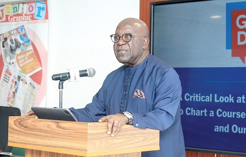 Sir Sam Jonah (left) speaking at the event in Accra