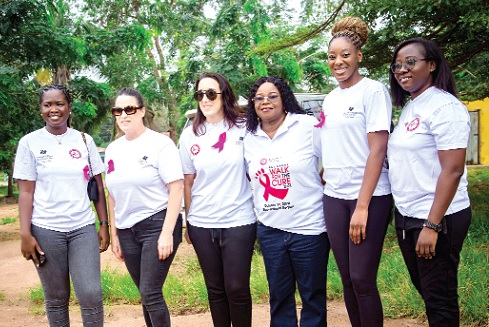 Dr Beatrice Wiafe Addai (3rd from right) with Management of Kempinski and BE Health Champions. INSET: Breast Cancer Survivors - BCI