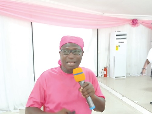 Dr Foster Amponsah-Manu (left), Clinical Director of the Eastern Regional Hospital, addressing breast cancer survivors and women in Koforidua