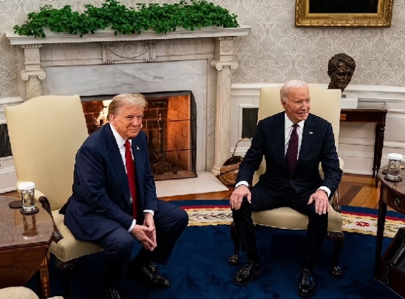 Trump and Biden smirk as reporters shout questions at them during their White House meeting 