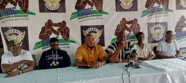  Bruce cudjoe (third left) with Abraham Kotej Neequaye (third right) speaking at the presser yesterday