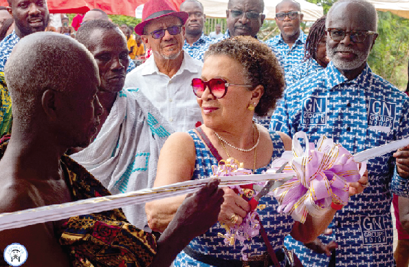 Yvonne Nduom cut the tape for inauguration of the block. Looking on is Dr Paa Kwesi Nduom (right), her husband