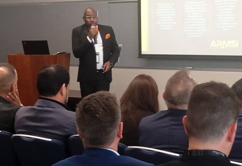 Moses Engadu (standing), Secretary-General, Africa Mineral Strategy Group, making a presentation at the workshop in Dubai