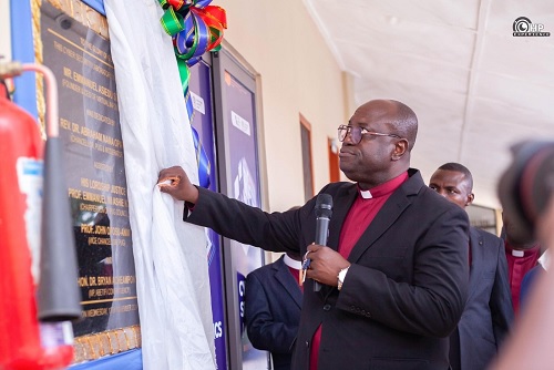  Rt Rev. Dr Abraham Nana Opare-Kwakye, the Chancellor of PUG, unveiling a plaque at the ceremony to open the lab