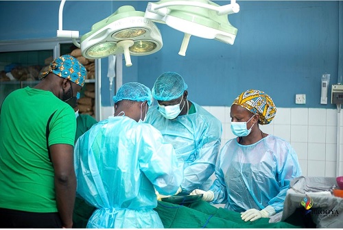 The team of plastic surgeons performing surgery on one of the patients 