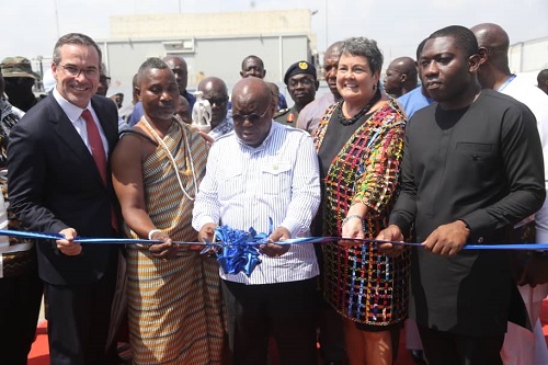  President Akufo-Addo (middle) being assisted by Herbert Krapa (right), Minister of State, Ministry of Energy, Virginia Palmer (2nd from right), US Ambassador to Ghana, Brain Herlihy (left), Chief Executive Officer, Endeavor Energy, to cut the tape to inaugurate the project. INSET: The Early Power Plant at Kpone near Tema. Pictures: SAMUEL TEI ADANO