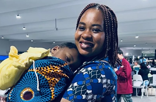 Adjoa pictured with her one year-old son, Leroy Kesse-Sam at COP29 in Azerbaijan. (Image: Shauna Corr)