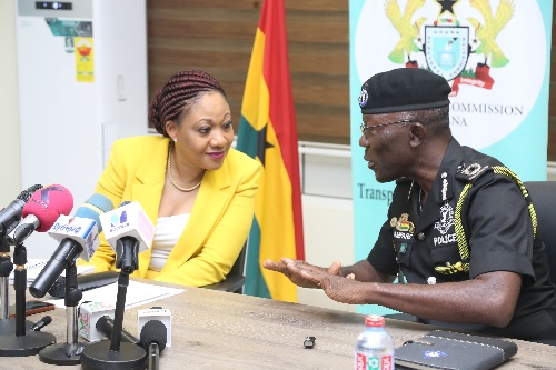 Dr George Akuffo Dampare (right), Head, National Election Task force, interacting with Jean Mensa, Chairperson, Electoral Commission, during a meeting at the Head Office in Accra. Picture: SAMUEL TEI ADANO