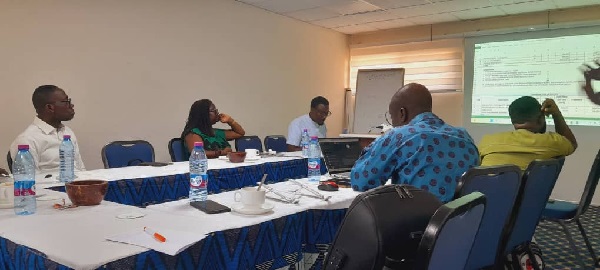 Participants at the review forum 