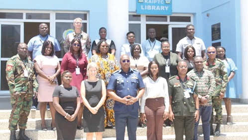 Air Cdre David Akrong (3rd from left), Deputy Commandant, KAIPTC, and Teresa Kraft (2nd from right), Head, Component of GIZ, with participants in the “Youth Starts With You” programme