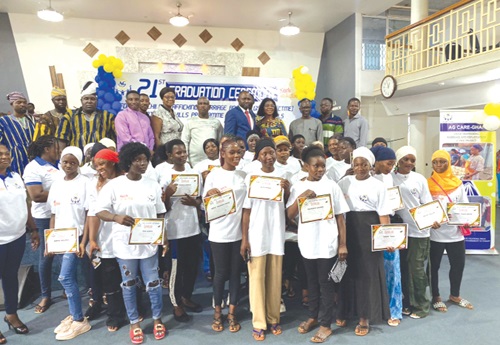 Graduates with dignitaries after the training