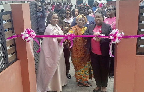  Dr Mrs Juliana Oye Amey (right), CEO of Trust Hospital, Manye Naa Emma (middle), Osu Sekwelor Manye, and Oheneyere Gifty Anti, special guest of honour, cutting the tape to signify the launch of the Pink October