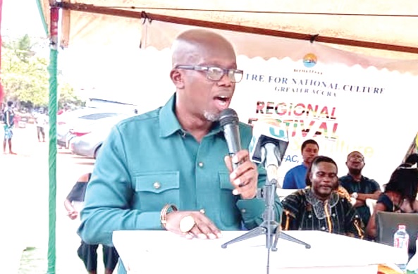 Nana Otuo Owoahene Acheampong (left),  Executive Director of the National Commission on Culture, speaking at the event