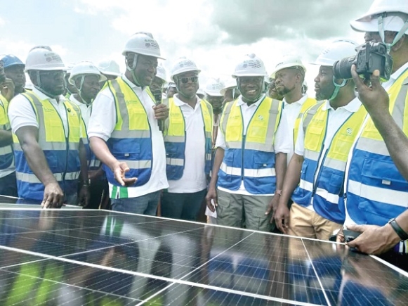 Samuel Kofi Ahiave Dzamesi (2nd from left), CEO of Bui Power Authority, inspecting the ongoing projects with board members and members of the parliamentary select committee on Energy