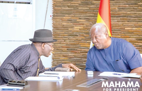  Former President John Dramani Mahama speaking to Goodluck Jonathan (left), leader of the West African Elders Forum, during the meeting