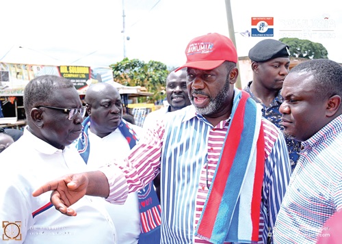  Dr Matthew Opoku Prempeh (right), running mate to the New Patriotic Party presidential candidate, with some party faithful at Ahenkro 