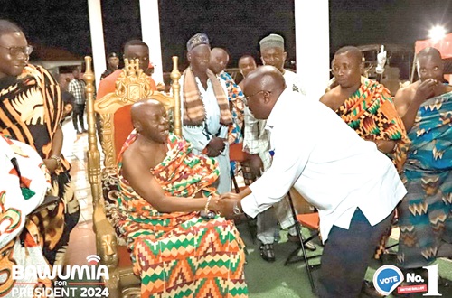 Ogyeahoho Yaw Gyebi ll (seated), Paramount Chief of Sefwi Anhwiaso Traditional Area, welcoming Dr Bawumia to his palace