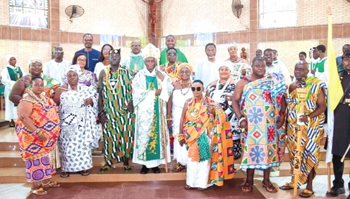 The Most Rev. Anthony Narh Asare (middle), Auxiliary Bishop of Accra, with the chiefs, queenmothers and the clergy after the ceremony