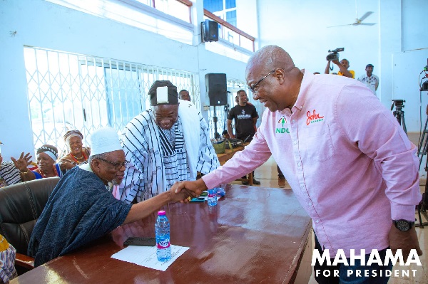 John Dramani Mahama, flagbearer of NDC (right), exchanging pleasantries with some of the chiefs 