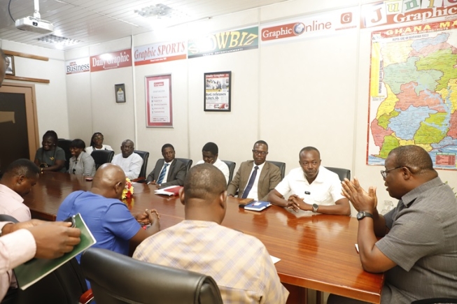 Theophilus Yartey (right), Editor, Graphic, addressing the delegation from the Fair Wages and Salaries Commission at the Editorial Conference of the Daily Graphic in Accra. With him are Benjamin Arthur (2nd from right), Chief Executive Officer of FWSC, and some members of the editorial team and officials of the commission Picture: EDNA SALVO KOTEY