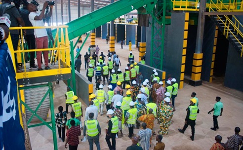  Dignitaries and the media touring the facility after the commissioning