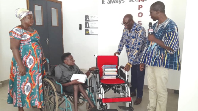 Leadership of Ghana Statistical Association presenting the items with Isaiah Amanda Awuku
