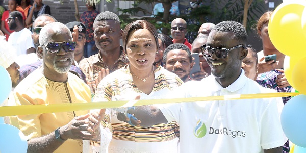 Enoch Kofi Boadu (right), CEO, DasBiogas Construction Limited; Ali Nuhu Abeka (left), Director in charge of petroleum downstream, Ministry of Energy, and Elizabeth Sackey (middle), Mayor, Accra Metropolitan Assembly, cutting a ribbon to commission the DasBiogas plant.Picture: BENEDICT OBUOBI