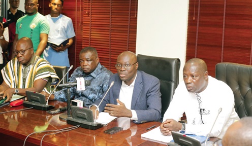  Dr Cassiel Ato Forson (2nd from right), Minority Leader in Parliament, addressing the press in Parliament. With him are Mahama Ayariga (left), Governs Kwame Agbodza (2nd from left) and Armah Kofi Buah, all members of the Minority Caucus