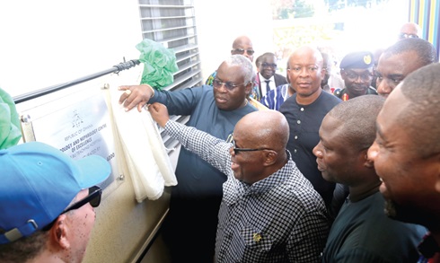 LEFT:  The front view of the Urology and Nephrology Centre at the Korle Bu Teaching Hospital. RIGHT:  President Akufo-Addo, unveiling the plaque to inaugurate the centre. SAMUEL TEI ADANO