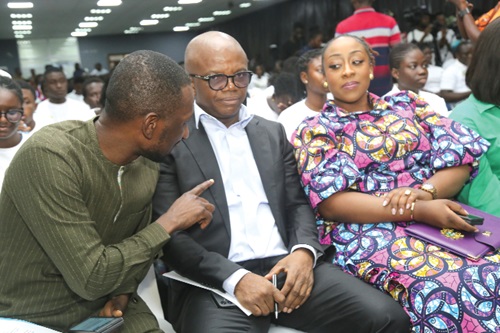  Kofi Ofosu Nkansah (left), Chief Executive Officer, NEIP, interacting with Stephen Amoah (2nd from right), a Deputy Minister of Finance, during the launch of the programme in Accra. With them is Lydia Atiemo (right), a Deputy Chief Executive of Youth Employment Agency. Picture: SAMUEL TEI ADANO