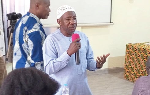 Andani Zakaria Abdulai (inset), Sagnarigu Municipal Education Training Officer, speaking at the event