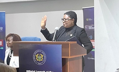 Justice Dr Bridget Kafui Anthonio-Apedzi (right), Justice of the High Court, administering the oaths at the inauguration