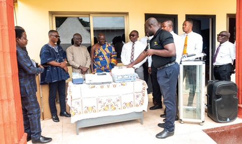 The leadership of the Church of Jesus Christ of Latter Day Saints, officials of the health centre and some community leaders at the presentation of the equipment