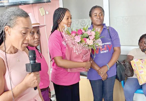  Juliet Erawoc Mills-Lutterodt (left), Founder of Pink for Africa,  making a presentation