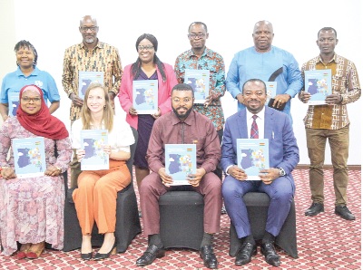 Dr Prince Hamid Armah (2nd from right)), the Deputy Minister of Works and Housing, Rev. Stephen Yaw Osei (right), the Chief Director of the Ministry of Works and Housing, with Celia Martinez (2nd from left), the Programme Management Officer of UNEP, and other officials after the event. Picture: CALEB VANDERPUYE 