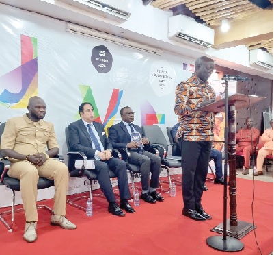Osei Assibey Antwi, Executive Director,  NSA, addressing the gathering. Behind him are some of the dignitaries, including Jules Armand Aniambossou (right), the French Ambassador, Maher Kheir (middle), Lebanonese Ambassador to Ghana, and Telngar Rassembeye, national representative of the French Volunteers in Ghana. Picture: ERNEST KODZI